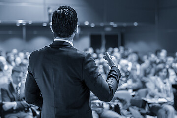 Image showing Speaker giving a talk at business conference meeting.