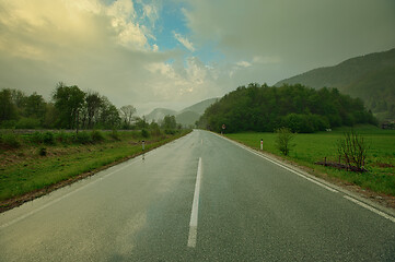 Image showing oad in mountains at morning fog