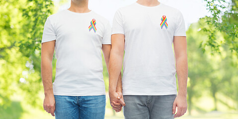 Image showing close up of couple with gay pride rainbow ribbons