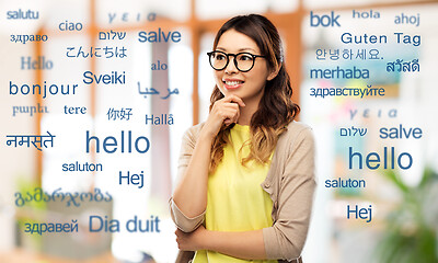 Image showing happy asian woman in glasses or student