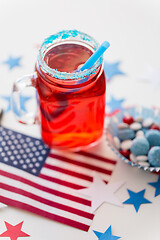 Image showing mug of juice and american flag on independence day