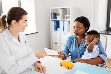 Image showing mother with baby son and doctor at clinic