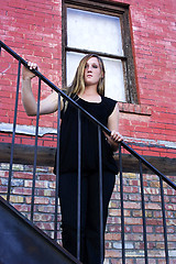 Image showing Beautiful Girl posing outdoors on stairs in the City