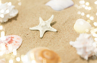 Image showing starfish and seashells on beach sand