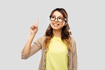 Image showing asian woman in glasses or student with finger up