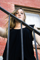 Image showing Beautiful Girl posing outdoors on stairs in the City