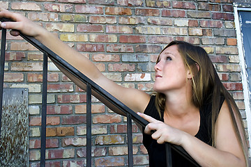 Image showing Beautiful Girl posing outdoors on stairs in the City