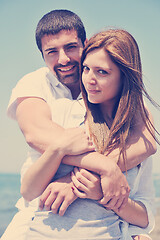 Image showing happy young couple have fun on beach