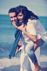 Image showing happy young couple have fun at beautiful beach