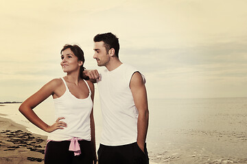 Image showing happy young couple have fun at beautiful beach