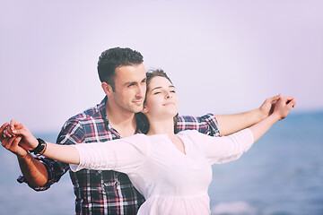 Image showing happy young couple have fun on beach