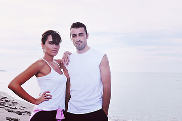 Image showing happy young couple have fun at beautiful beach