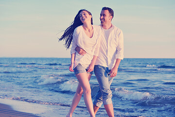 Image showing young couple  on beach have fun