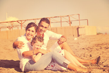 Image showing happy young  family have fun on beach