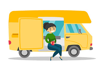 Image showing Caucasian white woman drinking coffee in motorhome