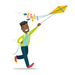 Image showing Young african-american man flying a kite.