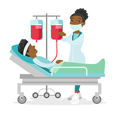 Image showing Doctor visiting patient lying in hospital bed.