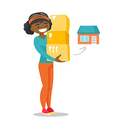 Image showing Young african-american woman moving to a new house