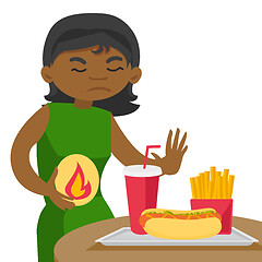 Image showing Sad african woman suffering from heartburn.