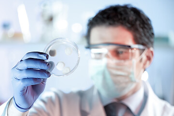 Image showing Scientist working in corona virus vaccine development laboratory research facility.