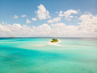 Image showing Picture perfect beach and turquoise lagoon on small tropical island on Maldives