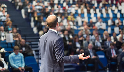 Image showing Public speaker giving talk at Business Event.