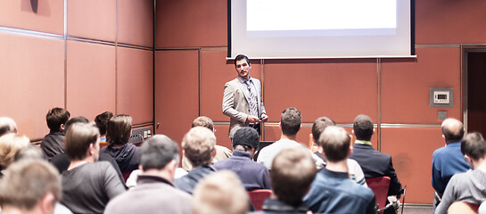 Image showing Business speaker giving a talk at business conference meeting event.