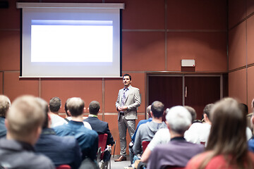 Image showing Business speaker giving a talk at business conference meeting event.