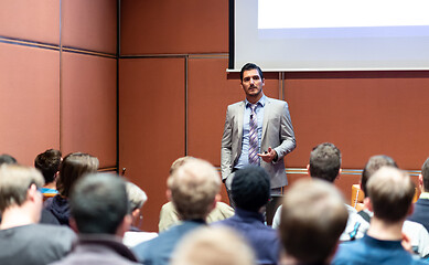 Image showing Business speaker giving a talk at business conference meeting event.