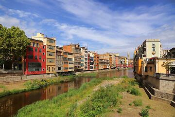 Image showing Colorful houses and Eiffel bridge and river Onyar in Girona