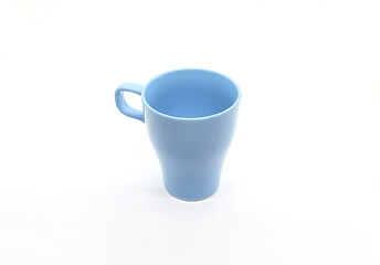 Image showing Bright blue ceramic cup isolated on white