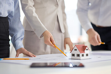 Image showing close up of architects discussing house project