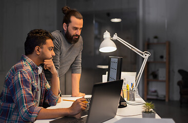 Image showing creative team with computer working late at office