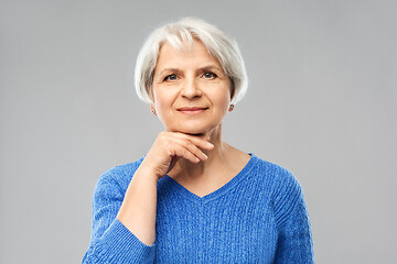 Image showing portrait of lovely senior woman in blue sweater