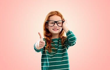 Image showing smiling red haired student girl in glasses