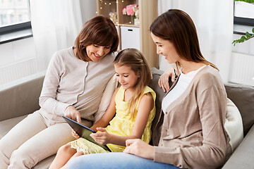 Image showing mother, daughter and grandmother with tablet pc