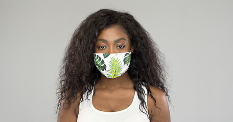Image showing Black woman in fabric mask