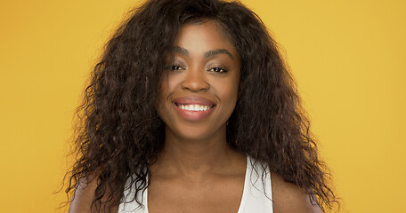 Image showing Happy ethnic female smiling for camera