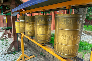 Image showing Prayer wheels in buddhist monastery