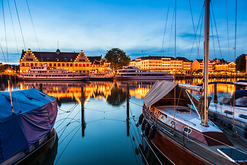 Image showing Night view of old harbour and city Lindau, Lake Constance in Germany. Bodensee.