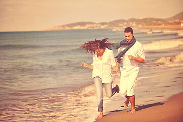 Image showing happy young couple have fun at beautiful beach