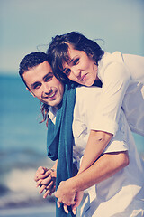 Image showing happy young couple have fun at beautiful beach