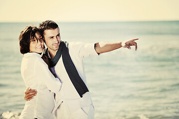 Image showing happy young couple have fun at beautiful beach