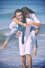 Image showing happy young couple have fun at beautiful beach