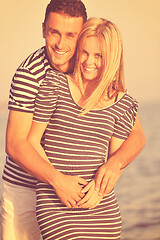 Image showing happy young couple have romantic time on beach