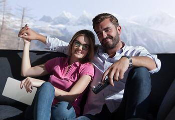 Image showing Young couple watching television