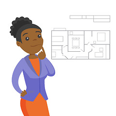Image showing Woman thinking about blueprint of new apartment.