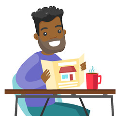 Image showing Young african man reading real estate advertising.