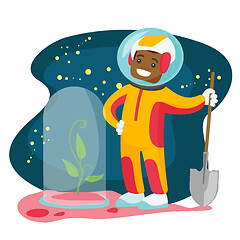 Image showing Caucasian astronaut planting tree on a new planet.