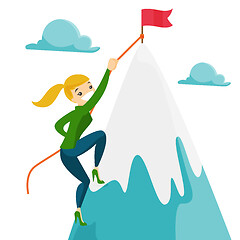 Image showing Business woman climbing to her business goal.